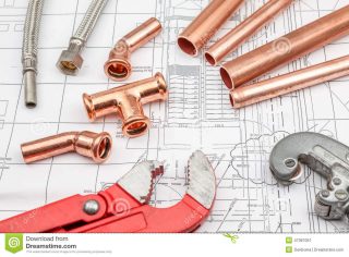 plan-plumber-plumbing-tools-arranged-house-plans-whit-copper-tubes-47367051